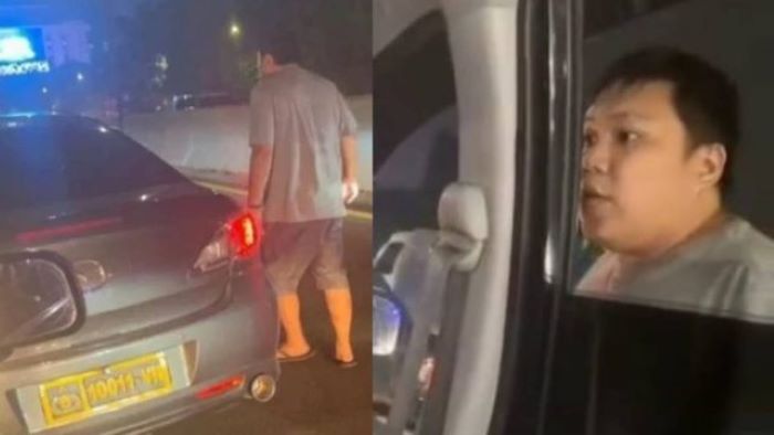 Video viral pengemudi mobil plat dinas Polri todong sopir taksi online di Tol Dalam Kota, Tomang, Jakarta Barat. - Image