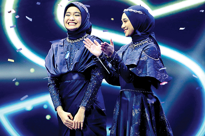 SALING SUPPORT: Salma Salsabil (kiri) dan Nabila Taqiyyah di malam Result & Reunion Indonesian Idol 2023 pada Senin (22/5) lalu. - Image