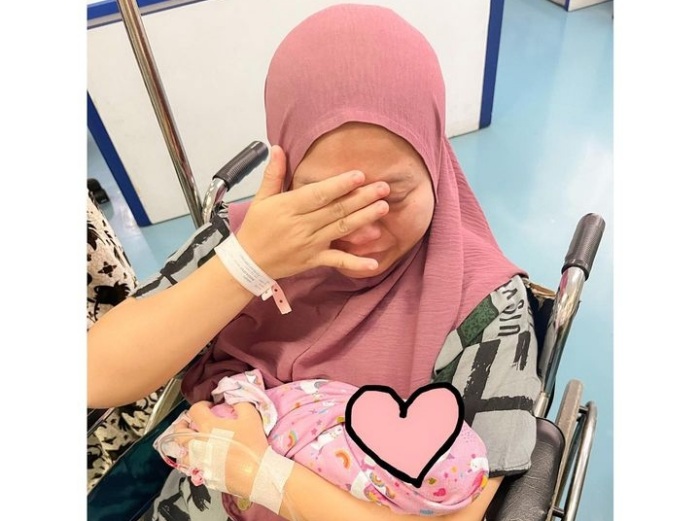 Musdalifah melahirkan anak kembar, salah satunya meninggal dunia./Instagram @musdalifahbasri - Image