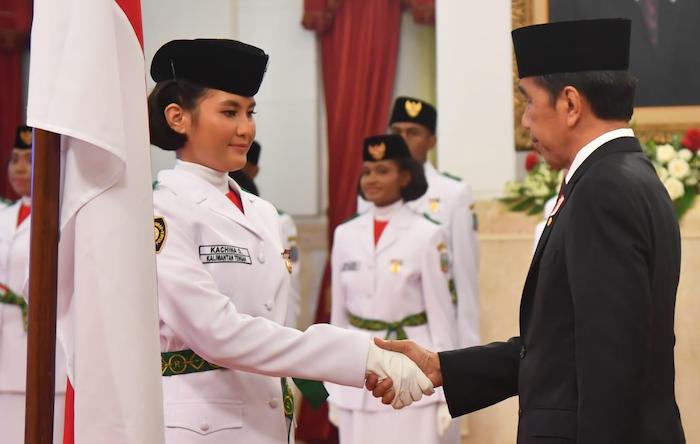 Presiden Jokowi saat meresmikan Anggota Paskibra 2023. - Image