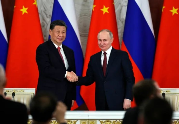 Putin disambut hangat saat tiba di China. - Image