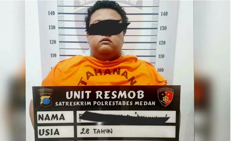 TikToker asal Medan, FM, ditetapkan tersangka atas dugaan menistakan agama Kristen. - Image
