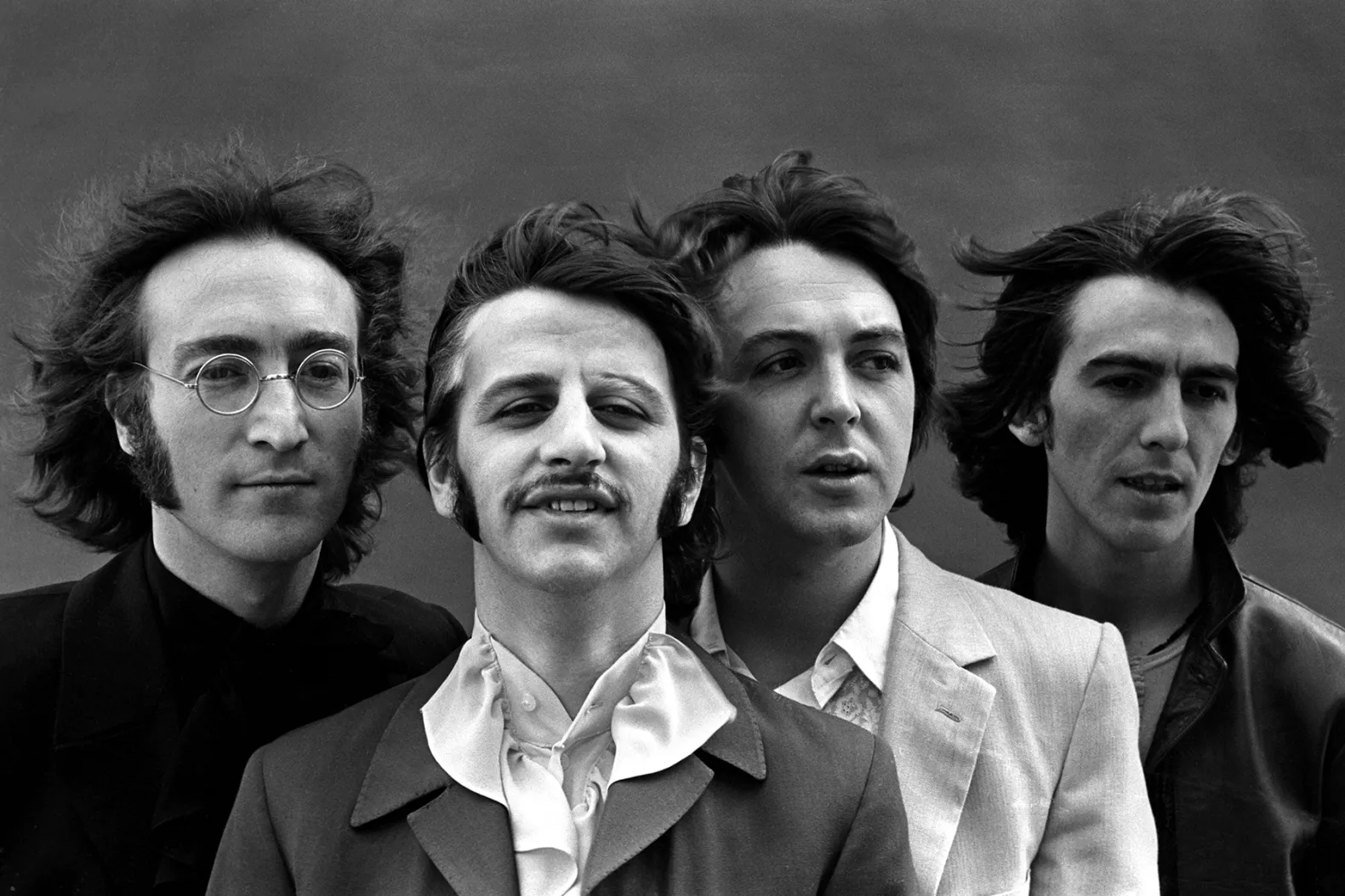 Grup band legendaris asal Inggris yang mengusung genre rock dan blues, The Beatles. - Image