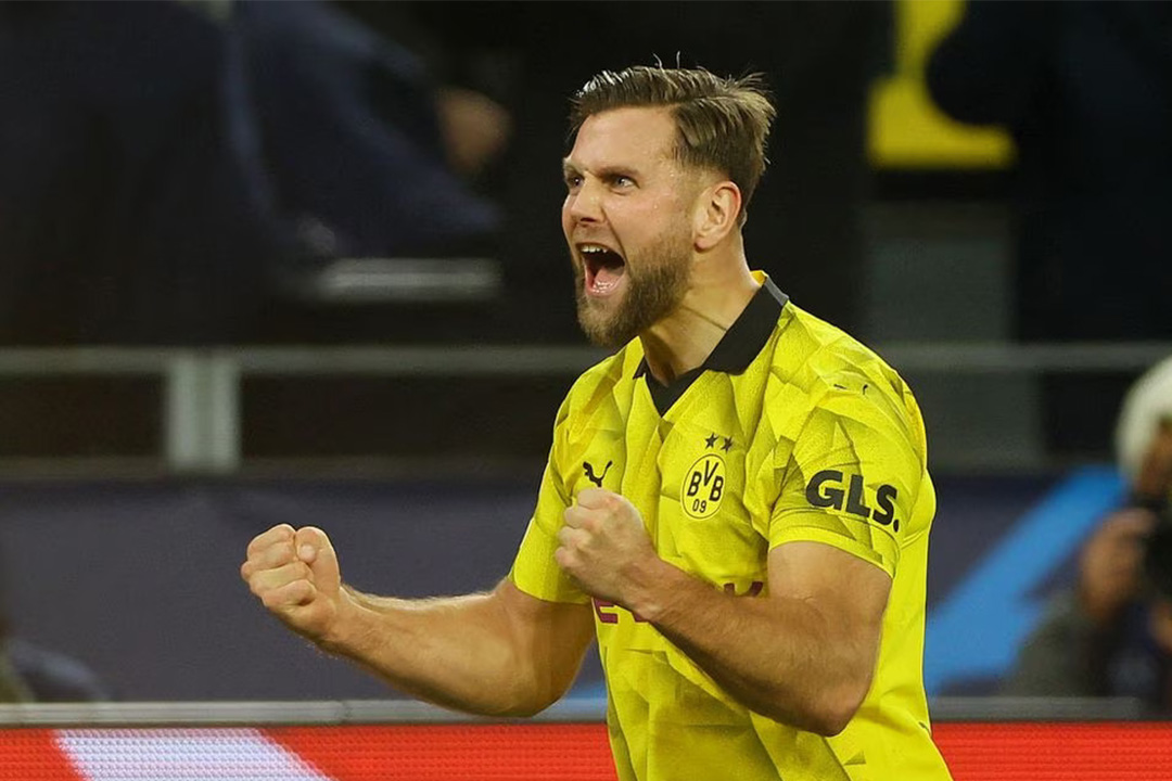 Striker Borussia Dormund, Niclas Fuellkrug berselebrasi setelah berhasil membuat skor untuk Dortmund pada babak pertama Liga Champions melawan Newcastle United pada Rabu dini hari (8/11/2023) . - Image