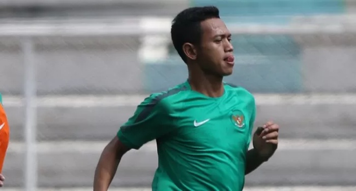Muchlis Hadi Ning Syaifulloh saat membela Timnas Indonesia berduet dengan Boaz Solossa. (JawaPos.com) - Image