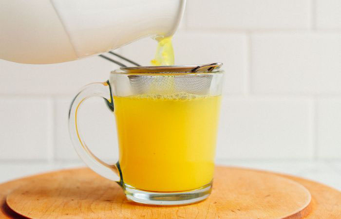 Ilustrasi minuman herbal dari kunyit - Image