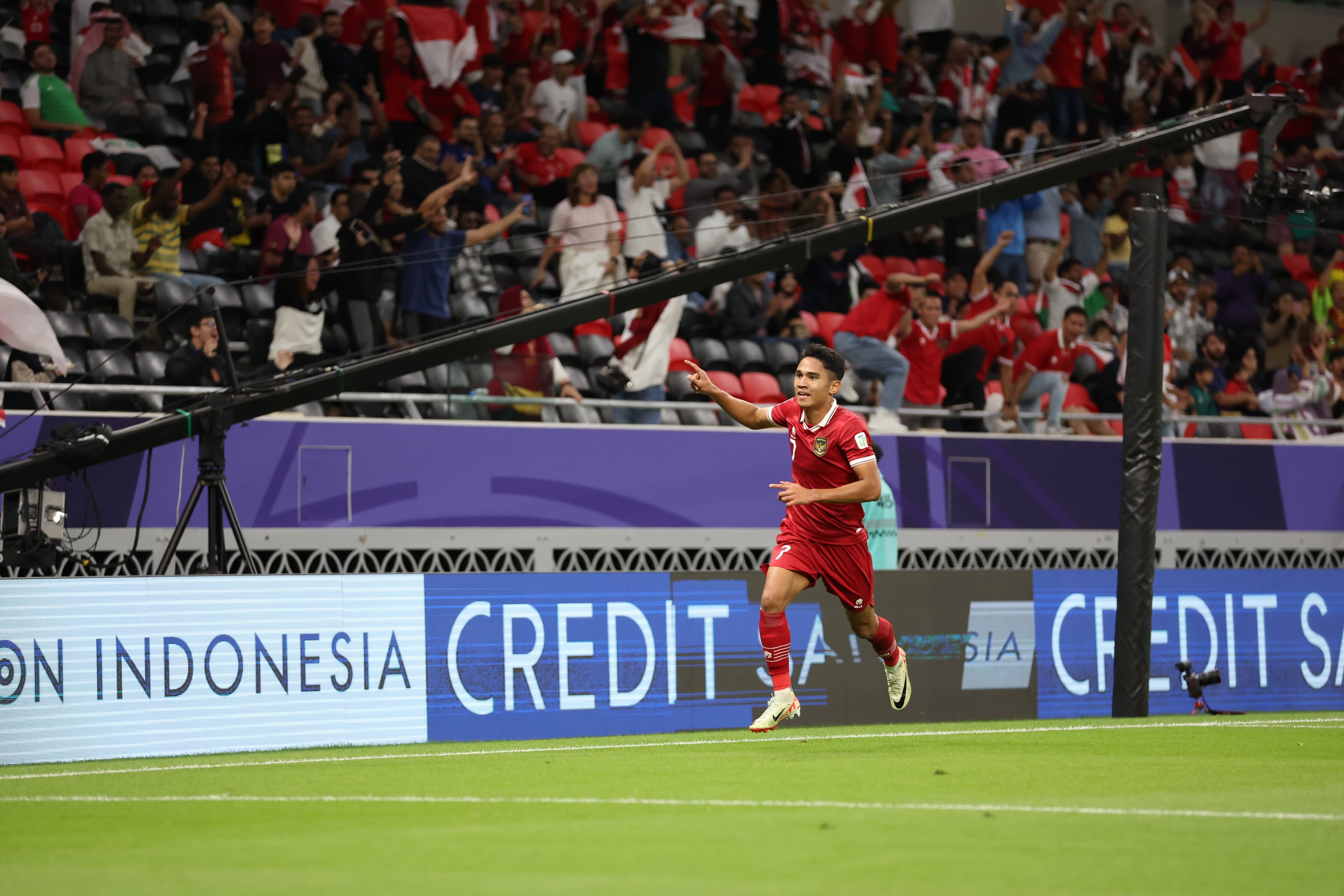 Selebrasi Marselino Ferdinan ketika berhasil menjebol gawang Irak di Piala Asia 2023. - Image