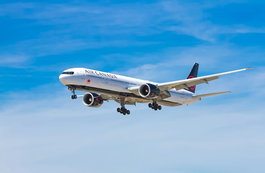 Air Canada di udara (Unsplash/John McArthur) - Image