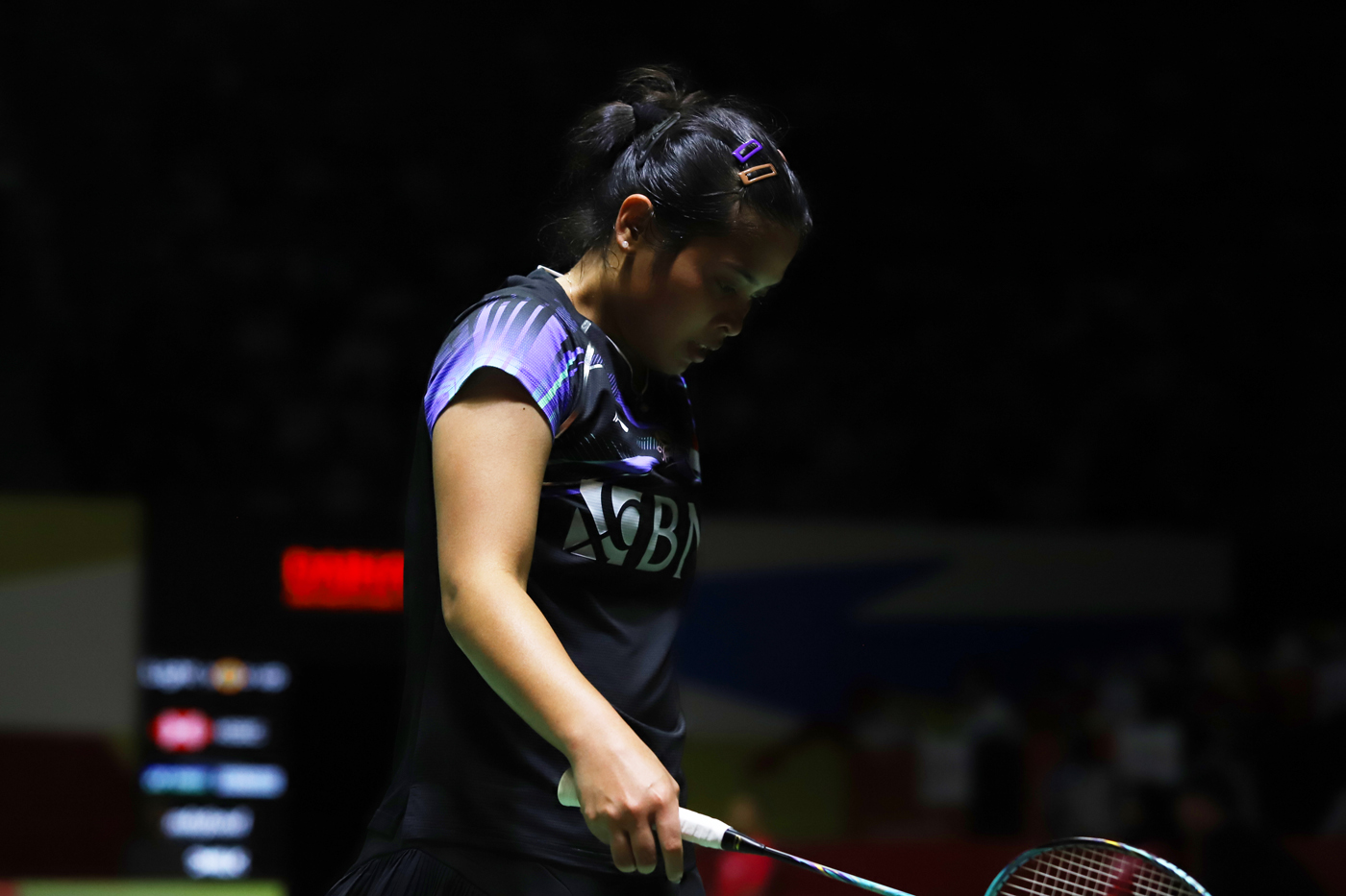 Pebulu tangkis tunggal putri Indonesia Gregoria Mariska Tunjung terdunduk lesu usai kalah pertandingan babak perempat final turnamen Indonesia Masters 2024 di Istora Senayan, Gelora Bung Karno (GBK), Jakarta, Jumat (26/1/2024). - Image