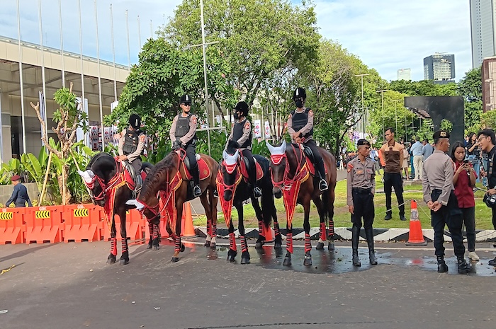 Pasukan polisi berkuda dikerahkan untuk mengamankan debat capres di JCC Senayan. - Image