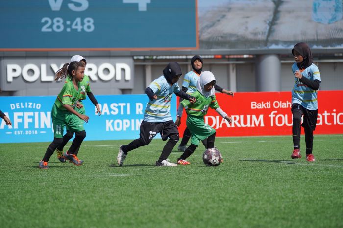 Pertandingan final MilkLife Soccer Challenge - Kudus Series 1 2024 di kategori U-10 antara SDN Jambean 02 Pati kontra SD MUH Birrul Walidain. - Image