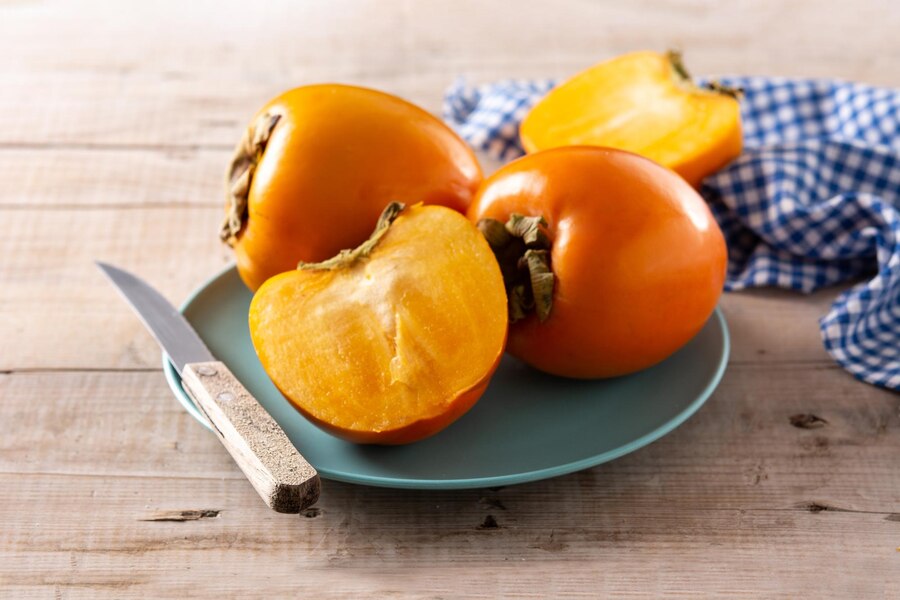 Buah Kesemek atau Persimmon Fruit./Freepik - Image