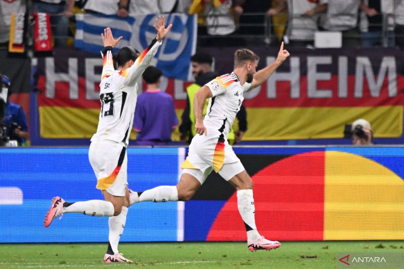 Penyerang Jerman Niclas Fuellkrug (kanan) merayakan gol yang dicetaknya ke gawang Swiss pada pertandingan Grup A Piala Eropa 2024 melawan Swiss. - Image