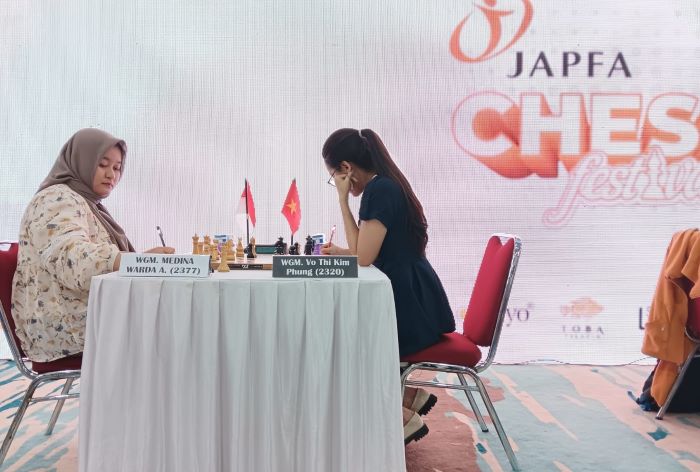 Dwi tarung internasional Japfa Chess Festival 2024 antara pecatur putri Indonesia WGM Medina Warda Aulia lawan WGM Vo Thị Kim Phụng (Vietnam). (Istimewa) - Image
