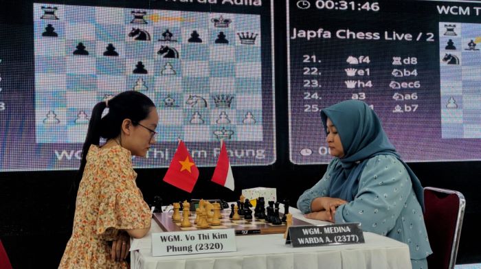 Pecatur Indonesia WGM Medina Warda Aulia raih satu kemenangan atas WGM Vo Thi Kim Phung dari Vietnam pada Japfa Chess Festival 2024. (Istimewa) - Image