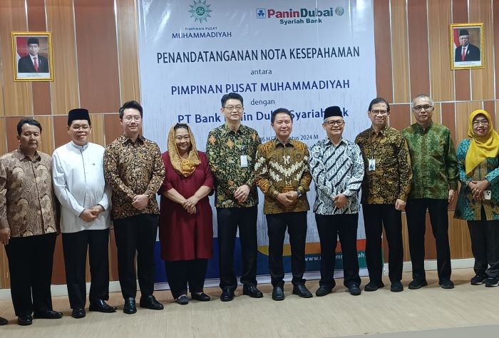 PT Bank Panin Dubai Syariah Tbk (PDSB) dan Muhammadiyah memperkuat kerja sama pemanfaatan produk dan layanan perbankan syariah. (Istimewa) - Image