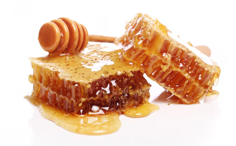 Foto madu dan honeycomb./Freepik - Image