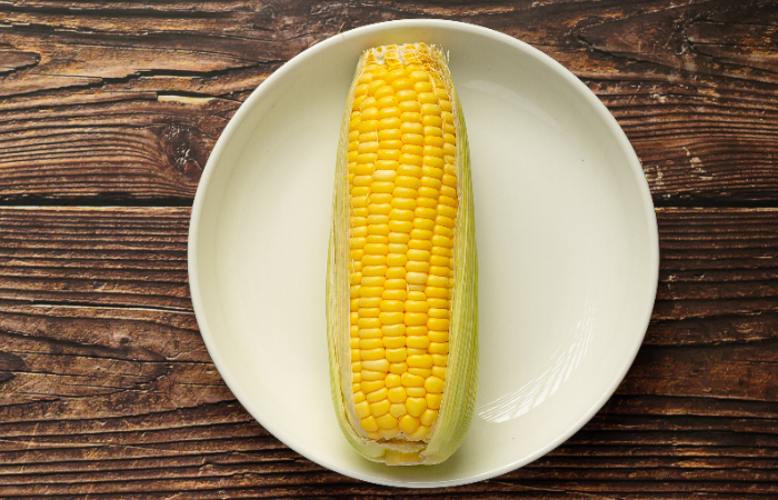 Ilustrasi 6 manfaat jagung rebus untuk kesehatan tubuh. (Freepik) - Image