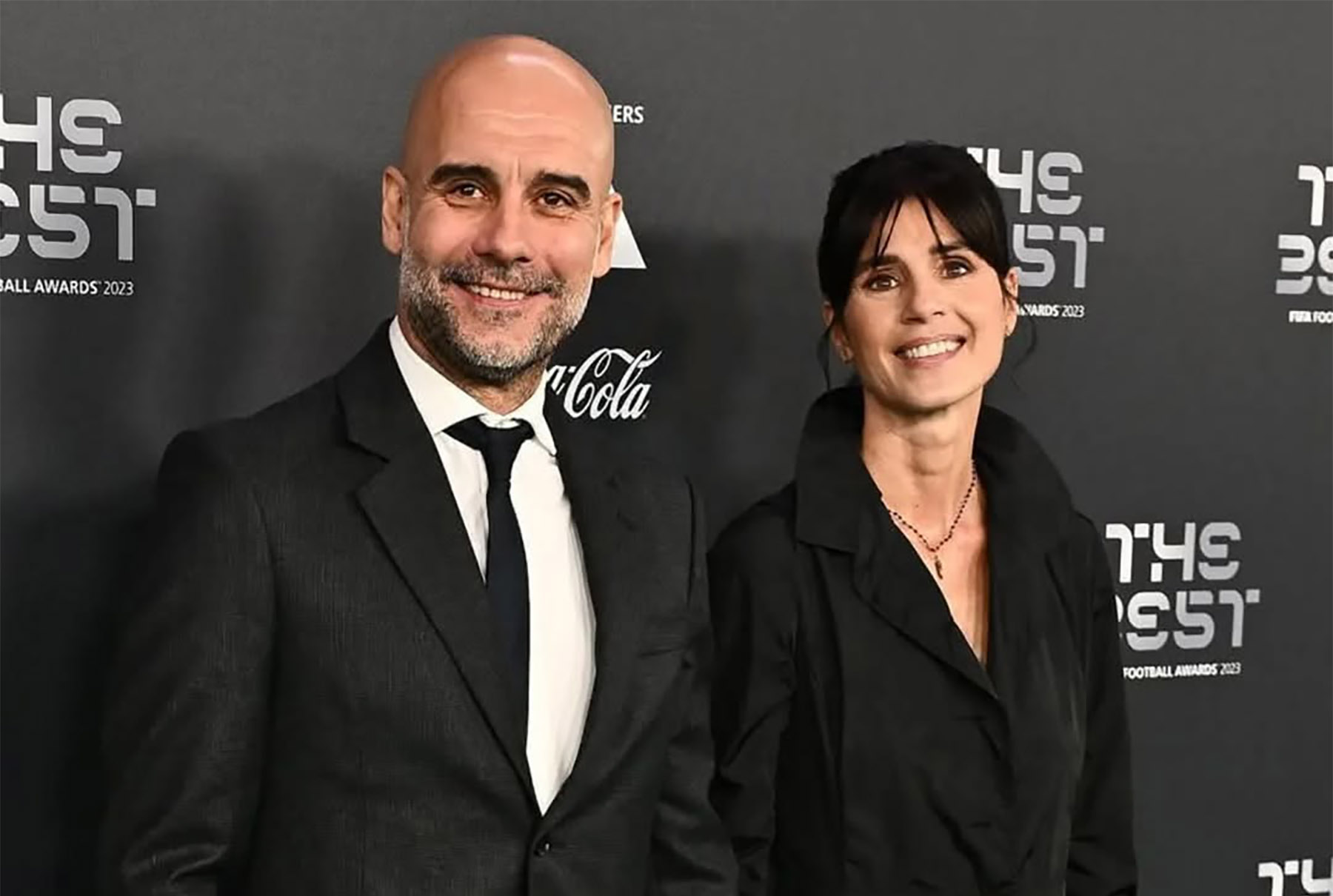 Pep Guardiola bersama Cristina Serra dalam sebuah kesempatan. (Dok. Instagram/son2babyactus) - Image