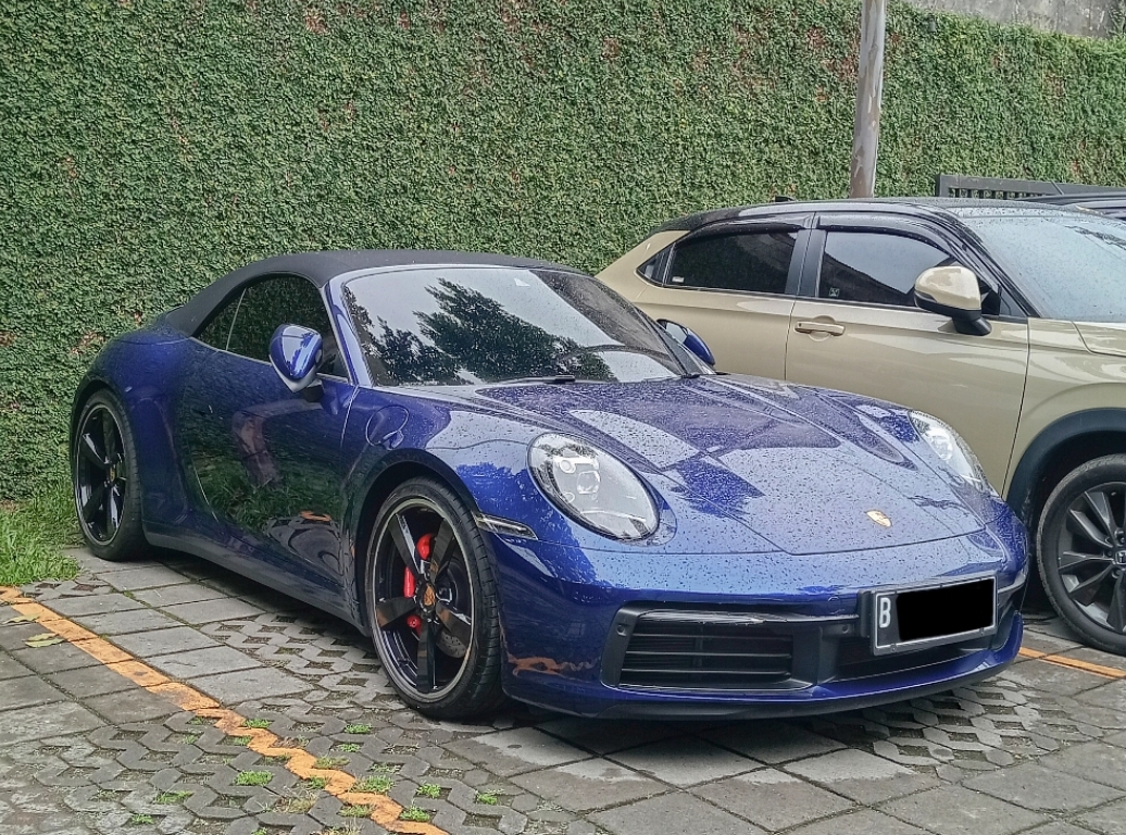 Ilustrasi sportscar Porsche 911. (Dionisius Sandytama Oktavian/JawaPos.com) - Image