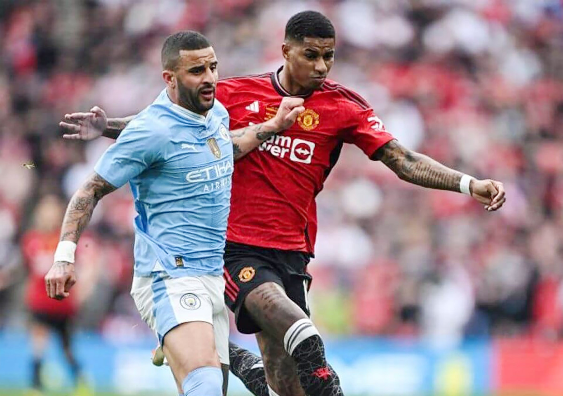 Kyle Walker dan Marcus Rashford. - Image