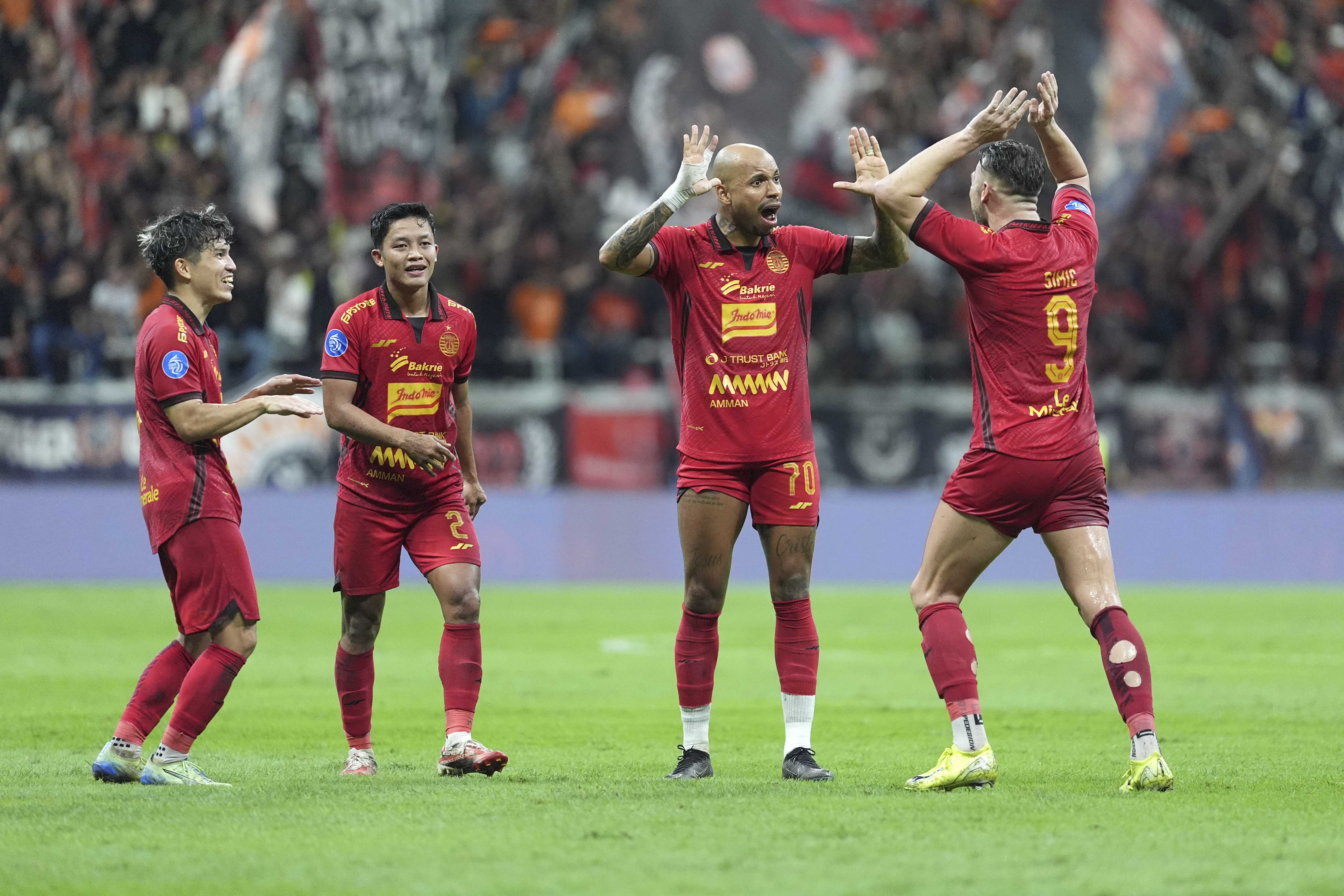 Para pemain Persija sedang berselebrasi di Liga 1 musim 2024/2025 (persija.id) - Image