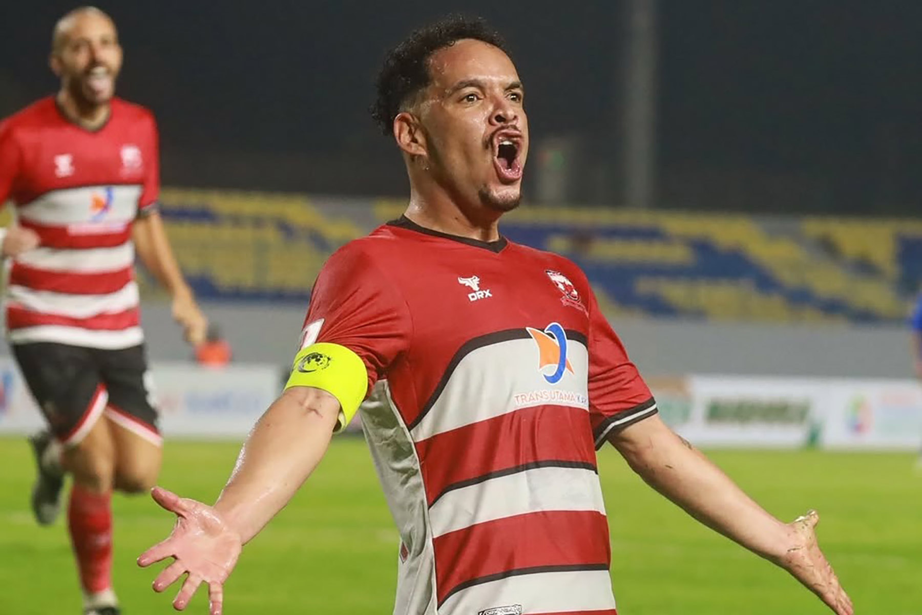 Kapten Madura United, Lulinha merayakan golnya di AFC Challenge League (Dok. Lulinha) - Image