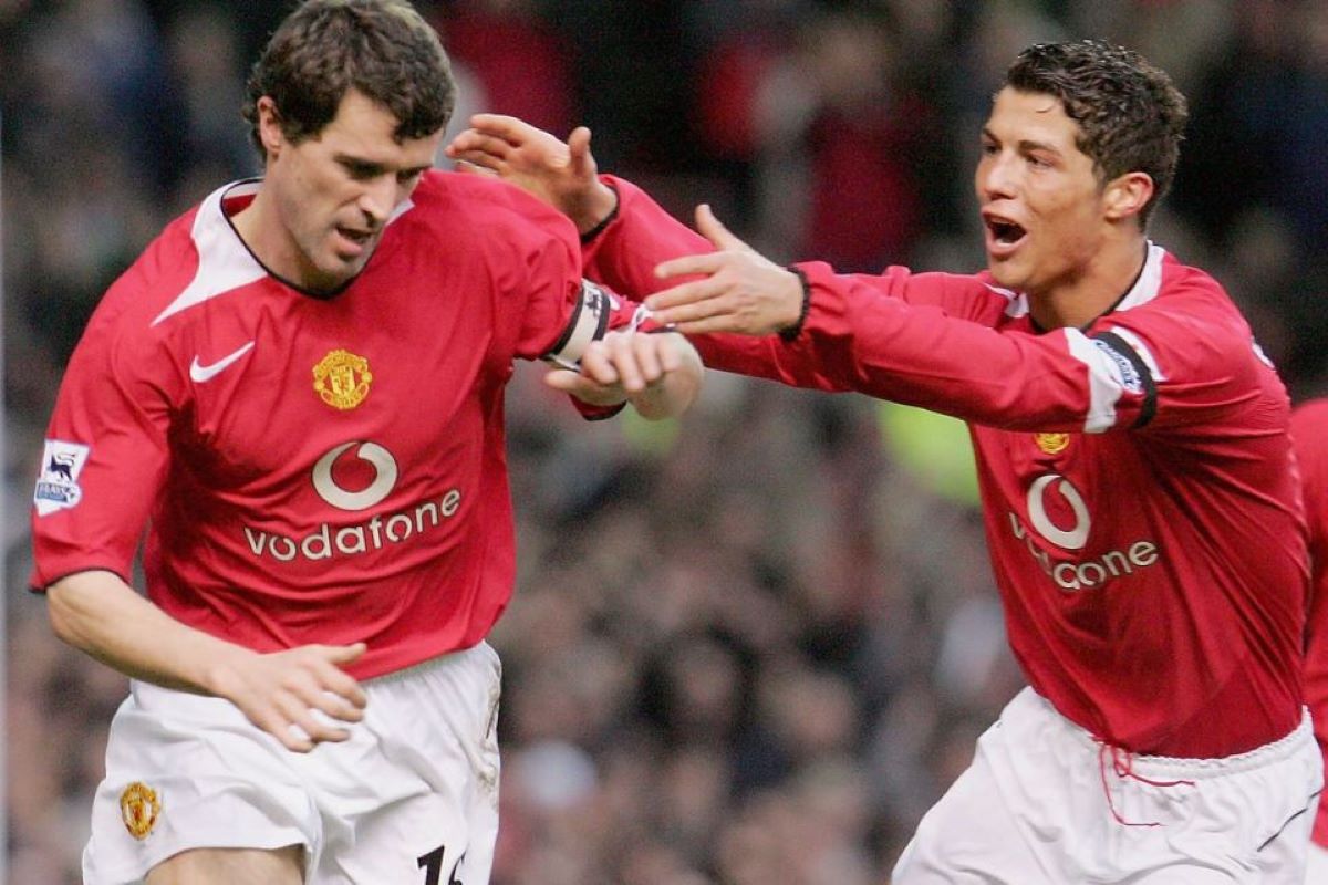 Roy Keane (kiri) dan Cristiano Ronaldo ketika bermain bersama di Manchester United. (Mancheser Evening News) - Image