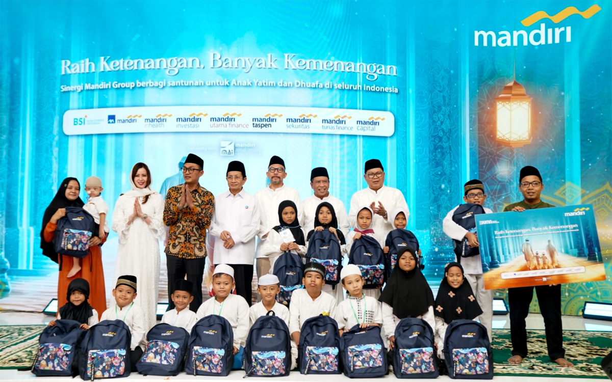 Bank Mandiri Group membagikan sekitar 57.600 paket Ramadhan yang disalurkan kepada anak yatim, masyarakat dhuafa serta lansia di seluruh Indonesia. (Istimewa). - Image