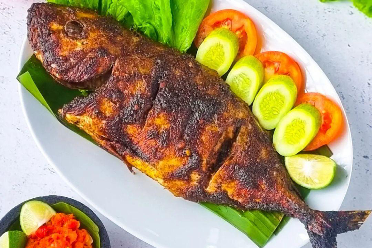 Ilustrasi menu ikan bakar. (ResepMamiku.com) - Image