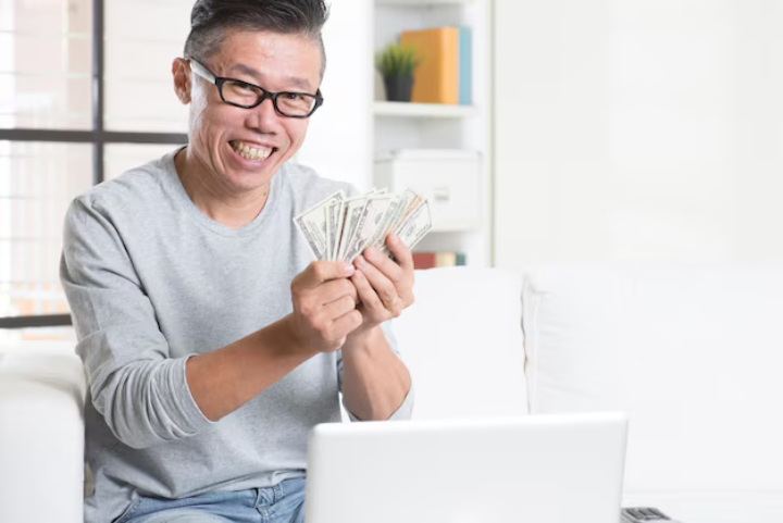 seseorang yang bersiap menerima kekayaan./Freepik. - Image