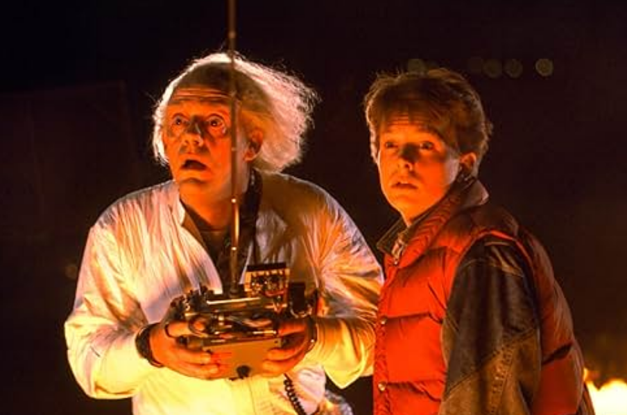 Michael J. Fox dan Christopher Lloyd dalam film Back to the Future (Dok. IMDb) - Image