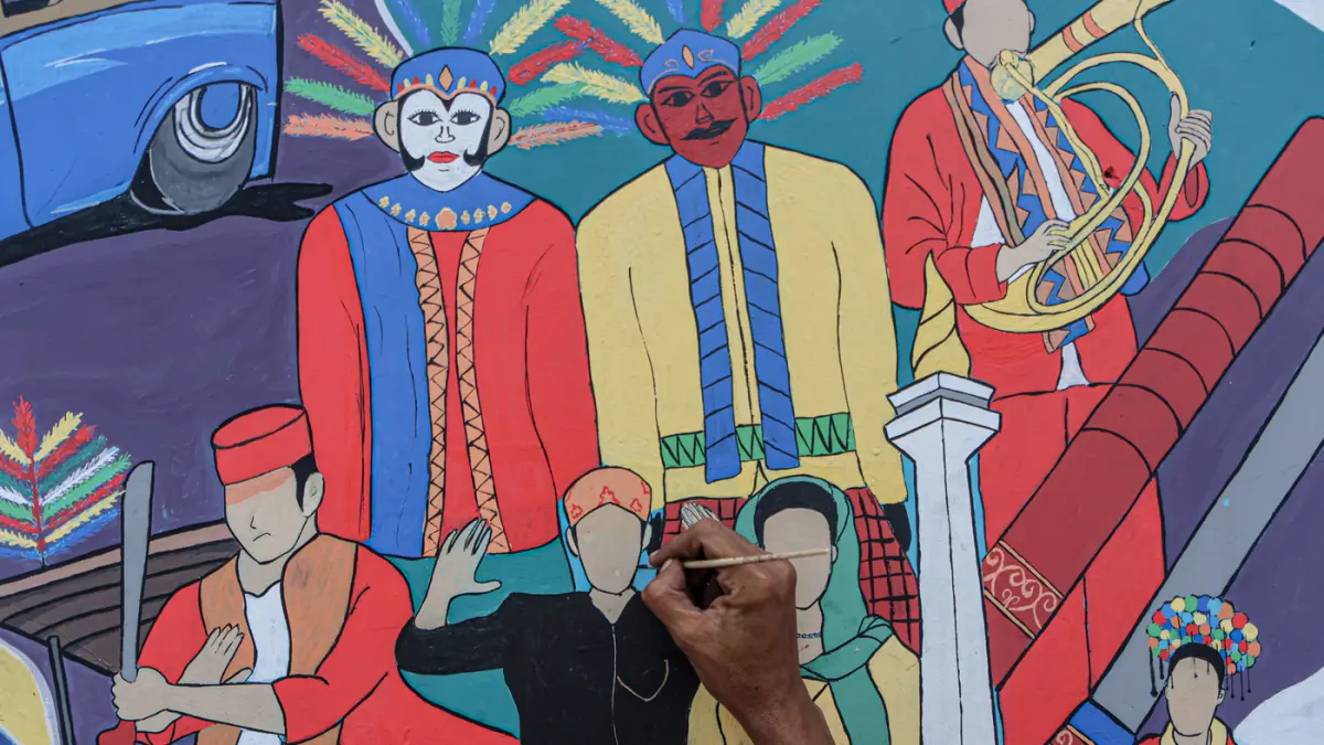 Sejumlah anggota PPSU membuat Mural di jalan Kapuk Kayu Besar, Jakarta, Senin (04/05/2026). (Hanung Hambara/Jawa Pos)