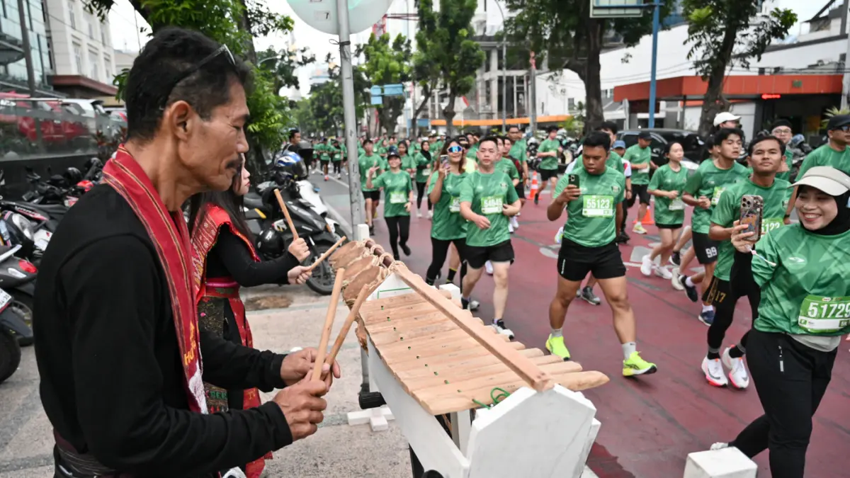 Antusiasme warga Medan yang mengikuti kategori Family Run 2,5K MILO ACTIV Indonesia Race 2026 Medan Series di Lapangan Benteng