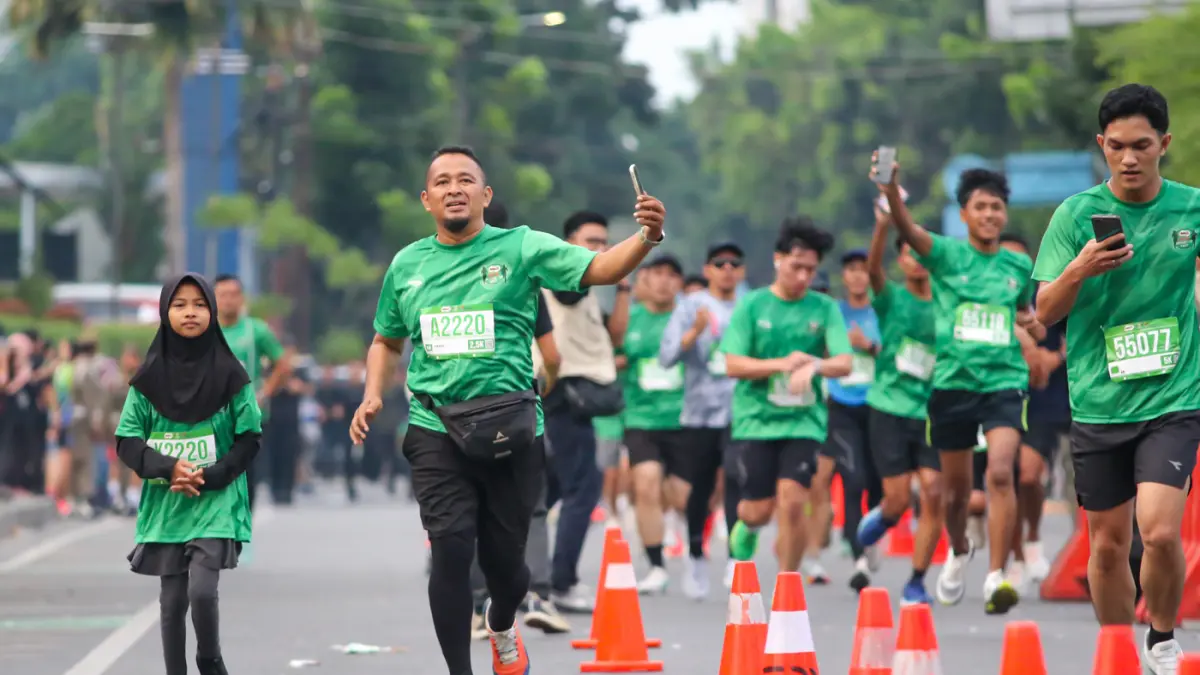 Antusiasme warga Medan yang mengikuti kategori Family Run 2,5K MILO ACTIV Indonesia Race 2026 Medan Series di Lapangan Benteng