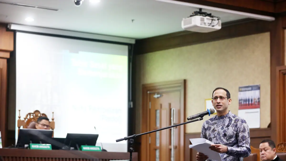 Terdakwa kasus dugaan korupsi pengadaan Chromebook dalam program digitalisasi pendidikan di Kemendikbudristek Nadiem Anwar Makarim saat membacakan menyampaikan pledoi (nota pembelaan) di Pengadilan Tipikor, Jakarta, Selasa (2/6/2026). (Dery Ridwansah/ Jaw