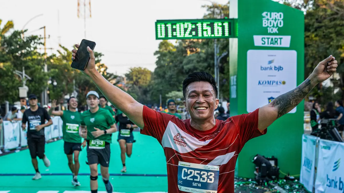 Pelari mengikuti Suroboyo 10K, Jawa Timur, Minggu (7/6/2026).