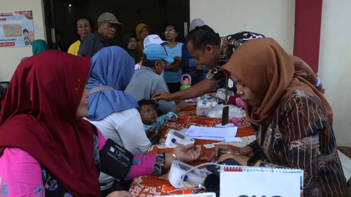 Warga mengikuti peringatan Hari Keamanan Pangan Sedunia di Kelurahan Pandean Lamper, Kecamatan Gayamsari,Kota Semarang,Jawa Tengah, Selasa (23/6/2026). (Nur Chamim/Jawa Pos Radar Semarang)