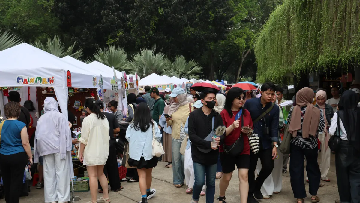 Pengunjung beraktivitas dalam acara Semasa Piknik di Taman Lapangan Banteng, Jakarta Pusat, Sabtu (28/6/2026). (Dery Ridwansah/ JawaPos.com)