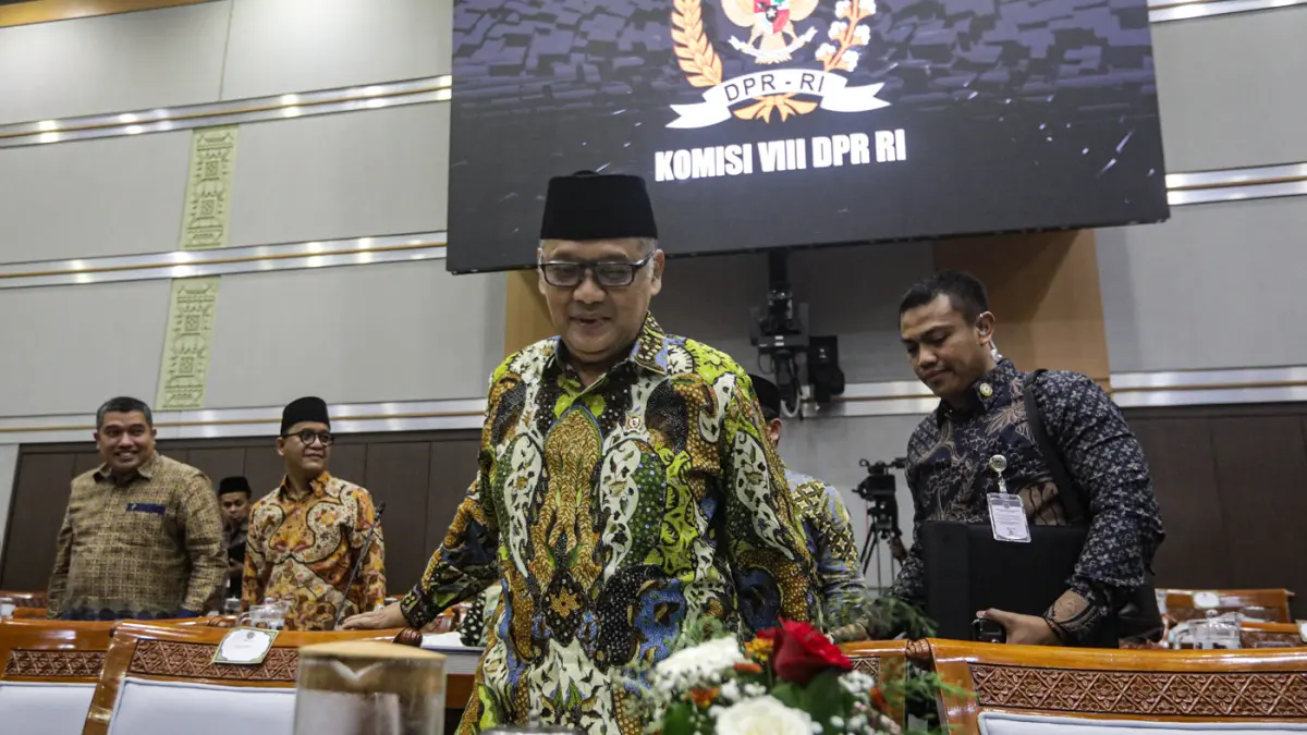 Menteri Haji dan Umrah Mochamad Irfan Yusuf mengikuti rapat kerja dengan Komisi VIII DPR di Kompleks Parlemen, Senayan, Jakarta, Selasa (14/7/2026). (Salman Toyibi/Jawa Pos)