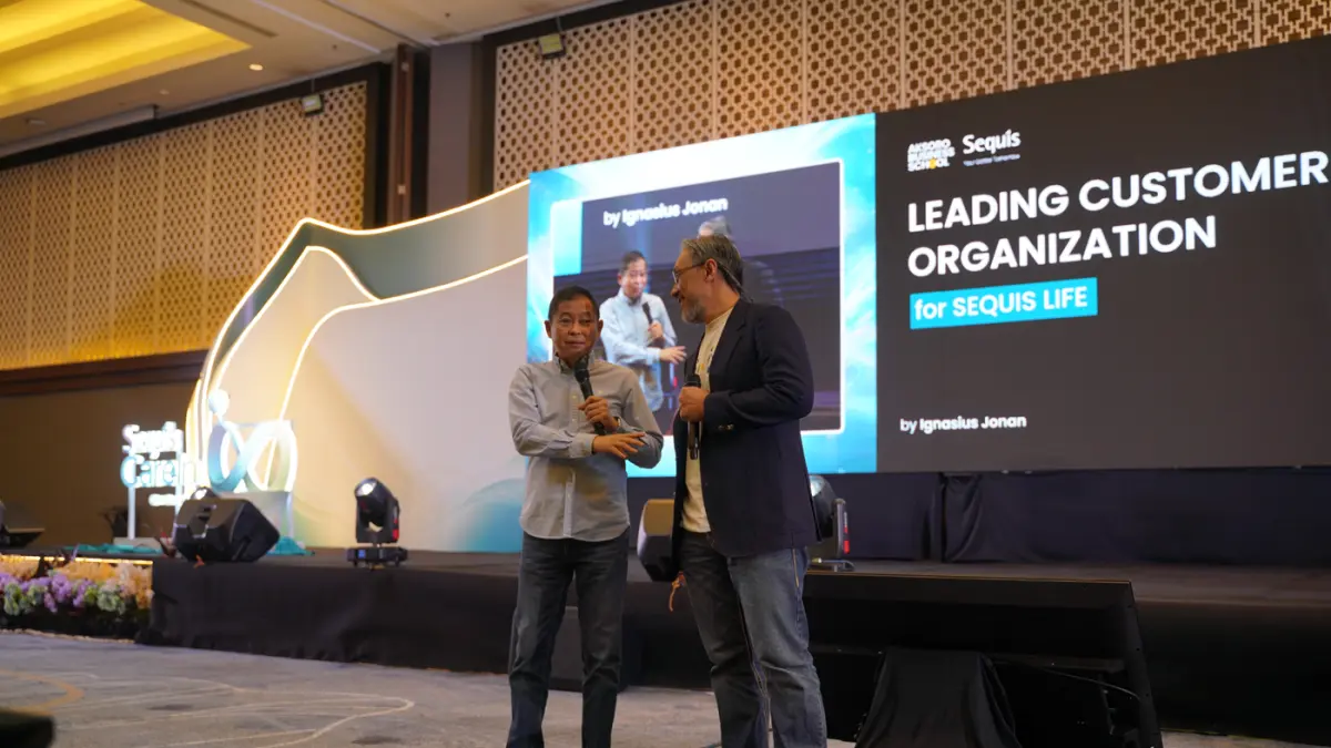 President Director & CEO Sequis Life Ted Margono berfoto Bersama Menteri Energi dan Sumber Daya Mineral (2016–2019), Ignasius Jonan