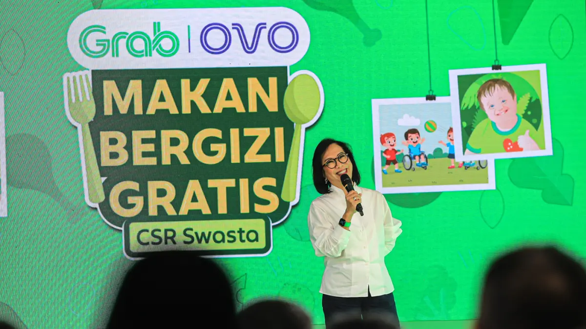CEO Grab Indonesia Neneng Goenadi memberikan sambutan saat kunjungan ke Sekolah Khusus Negeri 01 Balaraja dalam pelaksanaan Program MBG CSR Swasta Grab–OVO, Kamis (16/07/2026). (Hanung Hambara/ Jawa Pos)