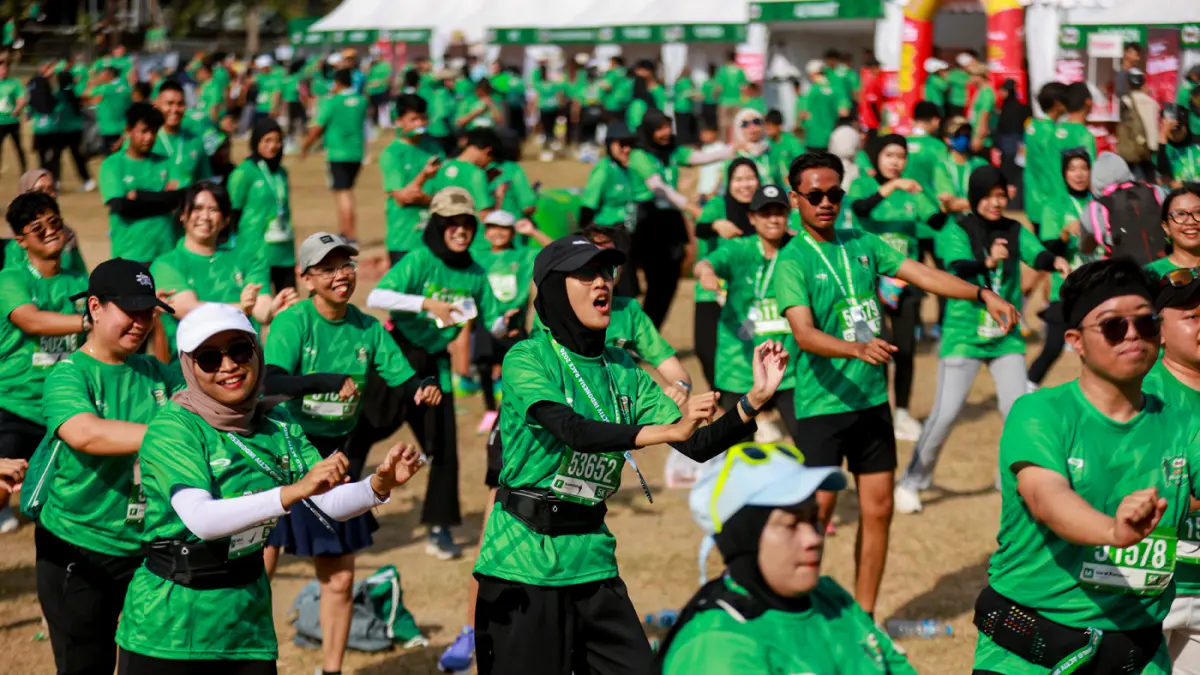 Antusiasme masyarakat Surabaya yang mengikuti kategori Family Run 2,5K MILO ACTIV Indonesia Race 2026 Surabaya Series