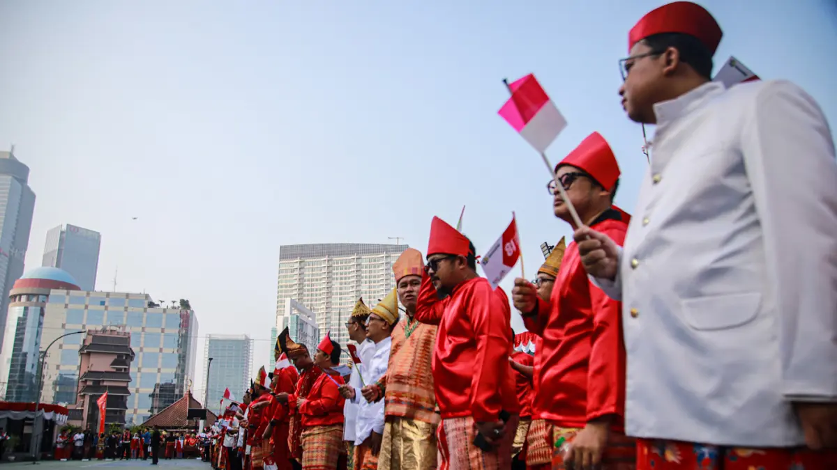 Para peserta mengikuti upacara HUT ke-81 RI di Kantor Kementerian Koperasi (Kemenkop), Jakarta, Senin (17/08/2026).(Hanung Hambara/Jawa Pos)