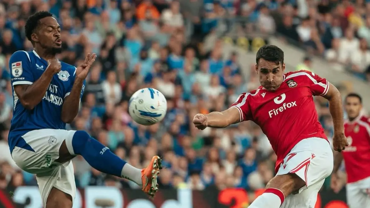 Wrexham harus rela bermain imbang lawan Cardiff City di Championship. (@wrexham_afc/Instagram). - Image