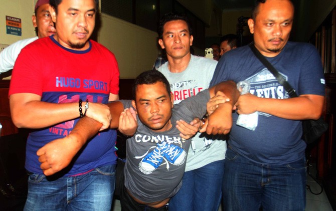 Andi Lala, tersangka pembunuhan satu keluarga di Medan. - Image