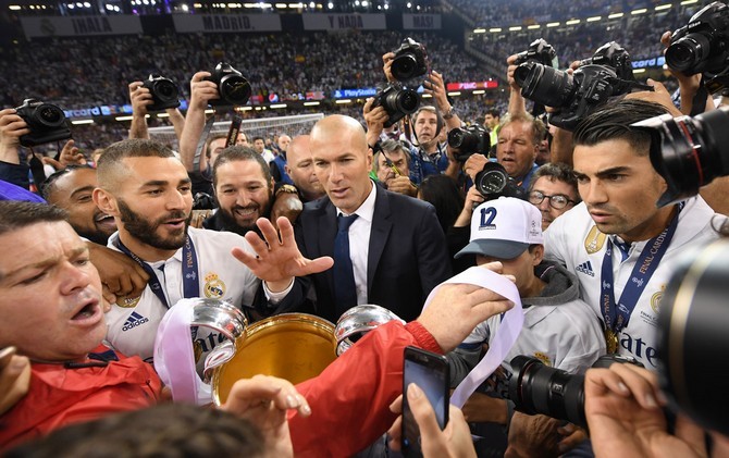 Kata-kata yang dilantunkan Zinedine Zidane saat jeda pertandingan membangkitkan motivasi pemain Real Madrid. - Image