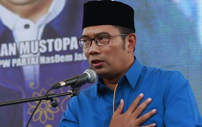 Wali Kota Bandung, Ridwan Kamil. Terkait pernyataan Hasto yang membandingkan kinerjanya dengan Risma dan Bima, Emil mencium apa yang dikatakan Hasto bermuatan politis - Image