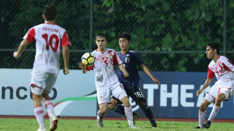 Laga Jepang kontra Tajikistan pada matchday 2 Grup A berakhir imbang 0-0. Namun, Jepang berhak atas puncak klasemen - Image