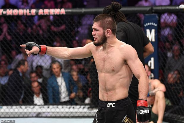 Petarung mixed martial arts (MMA) asal Rusia, Khabib Nurmagomedov berhasil mempertahankan sabuk juara dunia usai kalahkan Connor McGregor, Sabtu (6/10) - Image